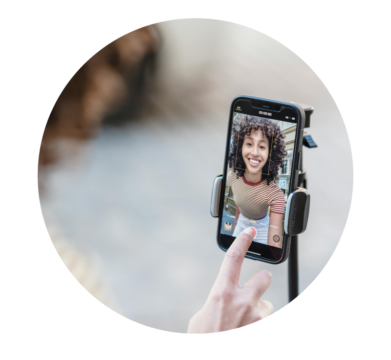 image of person recording themselves on a mobile device | Higher Ed Marketing & Student Search Services | enrollmentFUEL