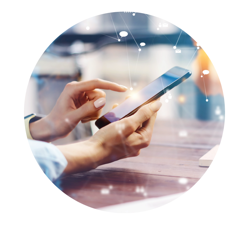 image of person using a mobile device with communication icons | Higher Ed Marketing & Student Search Services | enrollmentFUEL