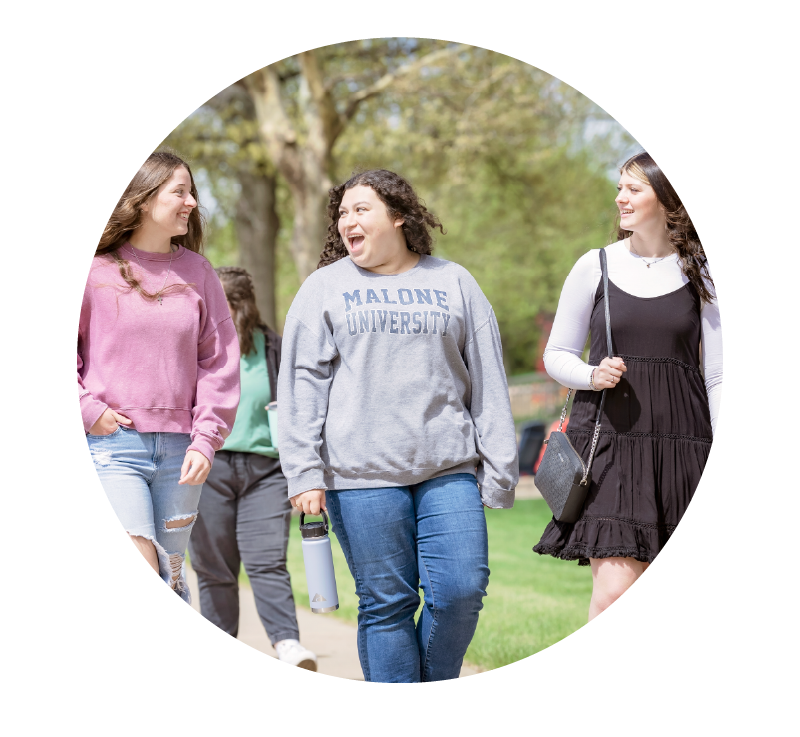 image of female college students walking to class together | Higher Ed Marketing & Student Search Services | enrollmentFUEL