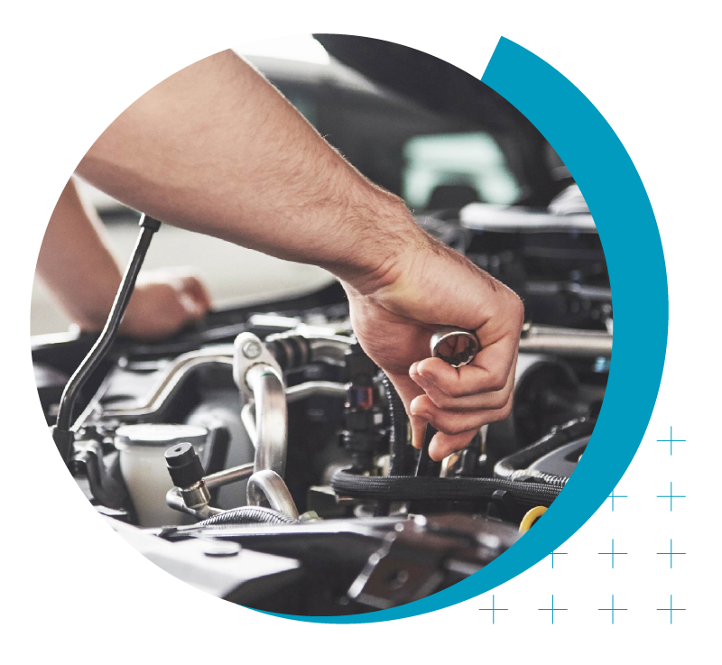 Higher Ed Marketing & Student Search Services | enrollmentFUEL | image of mechanic working under the hood of a vehicle